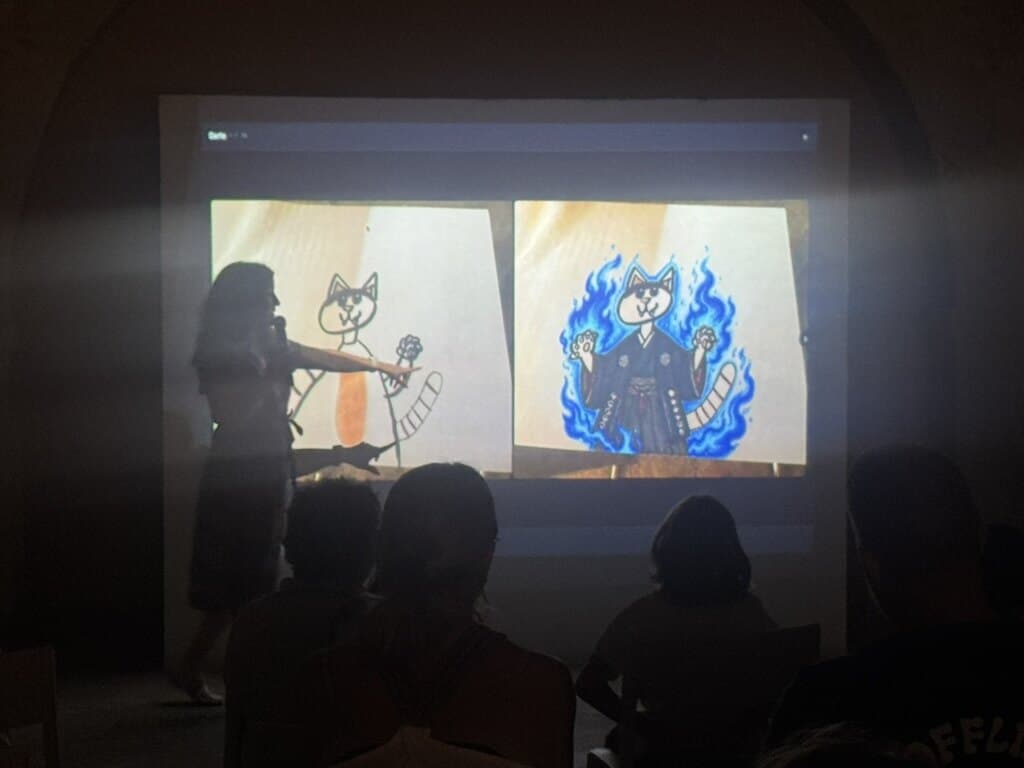 A hand-drawn cat transformed into an AI image during Demo Day