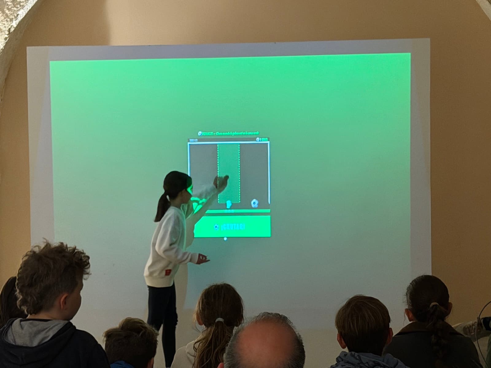 A student presenting her escape game at Demo Day