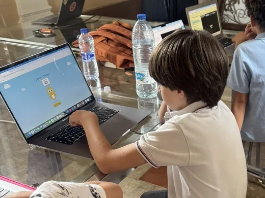 Building a game on the laptop.