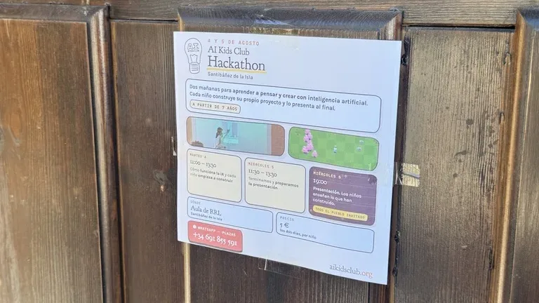 The hackathon poster taped to a wooden door in Santibáñez: 4 y 5 de agosto, Aula de RRL, todo el pueblo invitado